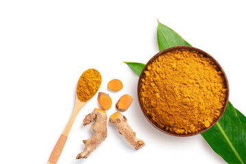 Spices and herbs , Turmeric powder in wooden bowl and spoon  isolated on white background. Top view