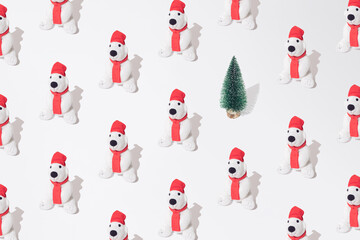 Plush toy polar bear with christmas tree pattern. White background.