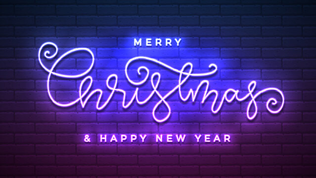 Merry Christmas Happy New Year hand lettering neon sign. Night bright fluorescent banner. Xmas winter holiday trendy poster. Neon ice blue uv light glowing luminous signboard on brick wall background