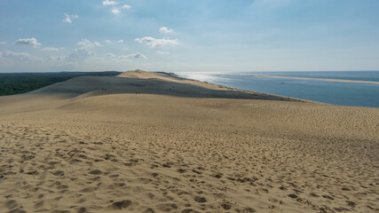 Fototapeta na wymiar Sandy dune du Pilat, the biggest sand dune in Europe with the pine forest, Arcachon, Nouvelle-Aquitaine, France