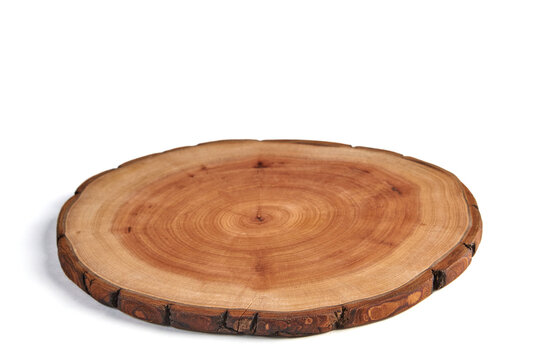 Wooden stand for a dish isolated on a white background. Tree trunk cut for product presentation demonstration