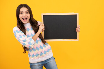 Little girl teen with blackboards. Teenager school girl hold blackboard for copy space, school sale.