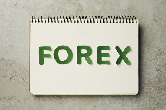 Notebook With Word Forex Made Of Green Letters On Grey Table, Flat Lay