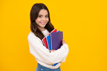 School child with book. Learning and education. Happy face, positive and smiling emotions of teenager girl.