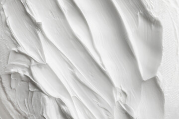 Texture of white facial cream, top view