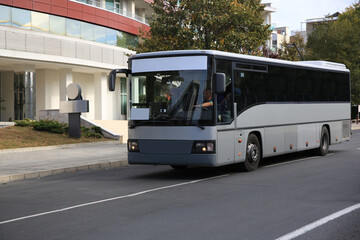Fototapeta premium Bus on road in city. Public transport