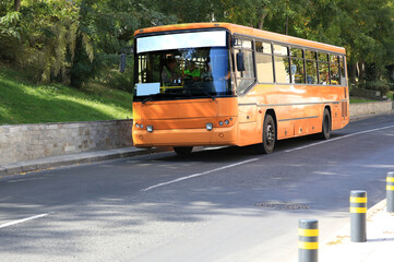 Fototapeta na wymiar Bus on road in city. Public transport
