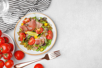 Plate of salad with mung beans on white table, flat lay. Space for text