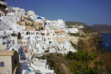 Fototapeta na wymiar Oia village with whitewashed houses on Santorini Island, Greece