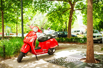 Beautiful red motorcycle on sunny day outdoors