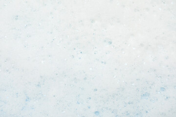 White washing foam as background, top view