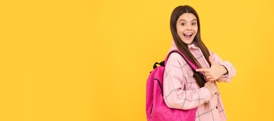 back to school. surprised teen girl in checkered shirt. happy kid casual style carry backpack. Banner of school girl student. Schoolgirl pupil portrait with copy space.