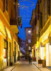 New Year's illumination streets of Parma city at evening, Italy