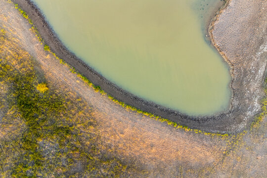 Drone top view of swamp. Swampy landscape. View of an marsh from height. Aerial photography.