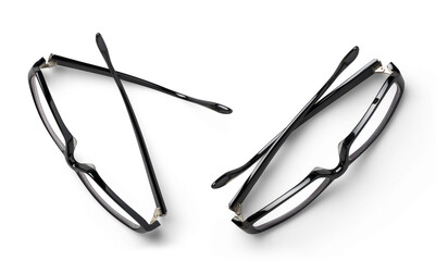 contemporary / modern pair of black hipster glasses in two different positions, business / lifestyle design elements isolated over a transparent background, top view / flat lay for your desk scenes - 549866139