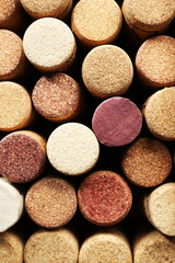 Many corks of wine bottles as background, top view