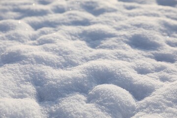 Fototapeta na wymiar Beautiful white snow as background, closeup view