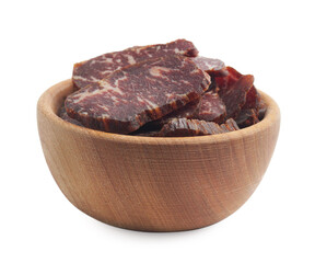 Delicious beef jerky in wooden bowl isolated on white