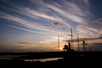 Space launch pad at sunset in Cape Canaveral, FL. Space shuttle station. Digitally enhanced. The elements of this image furnished by NASA. - Powered by Adobe