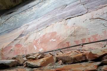 Ancient paintings, about 3000-4000 years old, on a stone wall, Thailand.