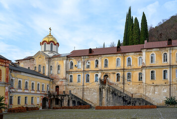 Fototapeta na wymiar The old building and courtyard of the Christian New Athos Simon-Kananite Monastery in Abkhazia