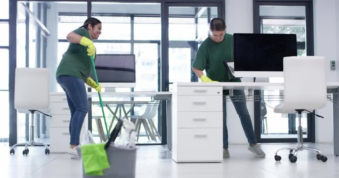 Cleaning, service and women in communication in a modern office while working on safety from covid. Happy, disinfection and talking cleaner people with a professional cleaning service for business