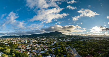 Aerial view of a big mountain at sunset. The beautiful city of Tuxtla Gutierrez in Mexico. Panorama.
