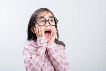 little girl asian shocked white background