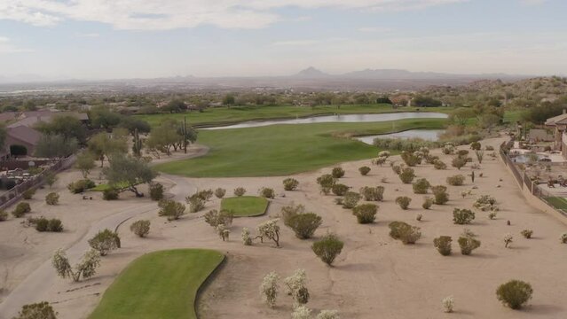 A aerial view of a desert golf course in the American southwest.