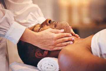 Senior man, spa massage and head for facial at salon for skincare, relax and wellness on table with...