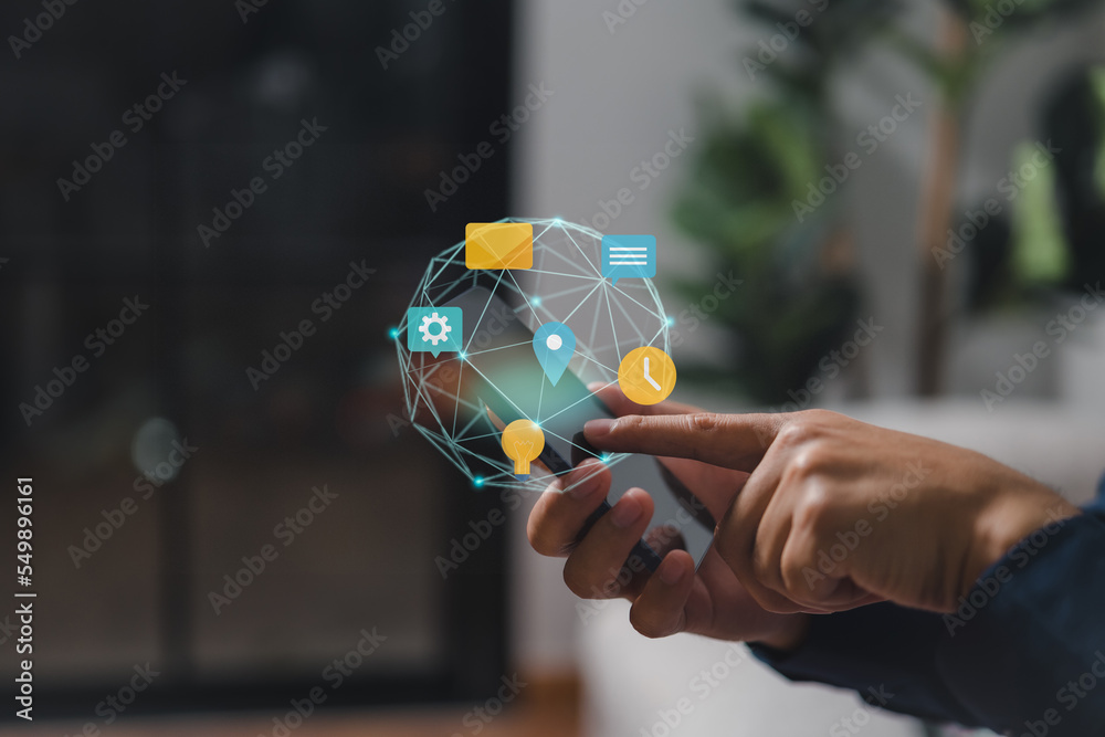 Poster Close-up of a businessman using a smartphone interacting with the screen on the internet with a chat call email icon, concept of contact us, contacting information, and communication of people