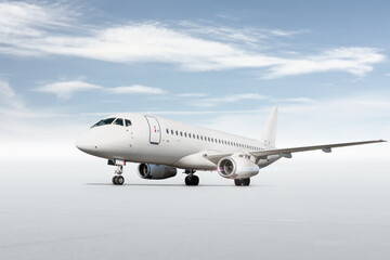 Fototapeta na wymiar White passenger airplane isolated on bright background with sky