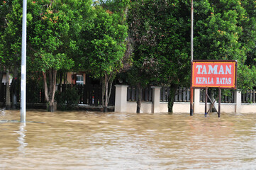 floods that submerged housing estates and roads