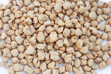Textured soy protein on white background.