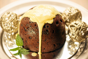 Gluten Free Christmas Pudding made on Organic Buckwheat Flour with sultanas, orange peel, papaya, pineapple, Australian currants, mango, ginger, rum, and cinnamon.