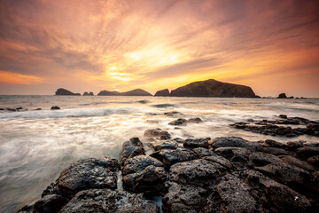 Landscape with Chagwido Island and strange volcanic rocks, view from Olle 12 corse in Jeju Island, Korea.
