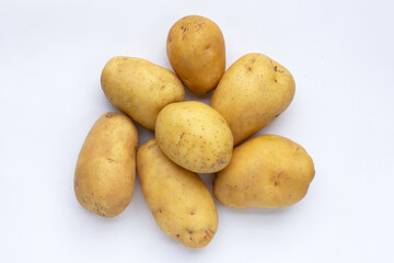 Raw potatoes on white background