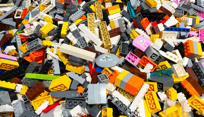 Popular toys, blocks building bricks background.