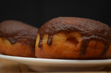 Beautiful handmade donuts covered in chocolate and sugar