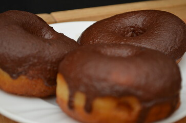 Beautiful handmade donuts covered in chocolate and sugar