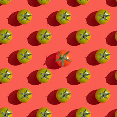 Seamless pattern with fresh tomatoes on red background.