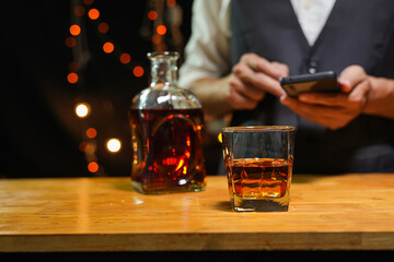 Bartender Serve Whiskey, on wood bar, 