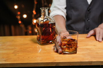 Bartender Serve Whiskey, on wood bar, 