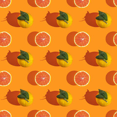 Seamless pattern with fresh red orange on yellow background.