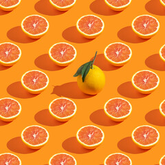 Seamless pattern with fresh red orange on orange background.