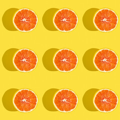 Seamless pattern with red orange on yellow background.
