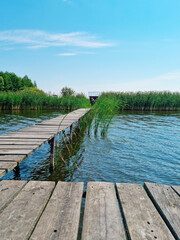 wooden bridge in the river for fishing