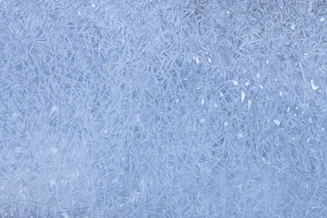 Fototapeta na wymiar winter ice natural background, hoarfrost pattern, Frost on the glass, the effect of freezing