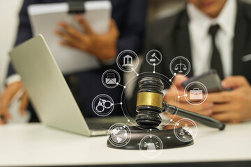 judge on wooden table And experienced lawyers meet with clients and give advice behind the scenes. legal services legal consulting concept