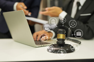 judge on wooden table And experienced lawyers meet with clients and give advice behind the scenes. legal services legal consulting concept